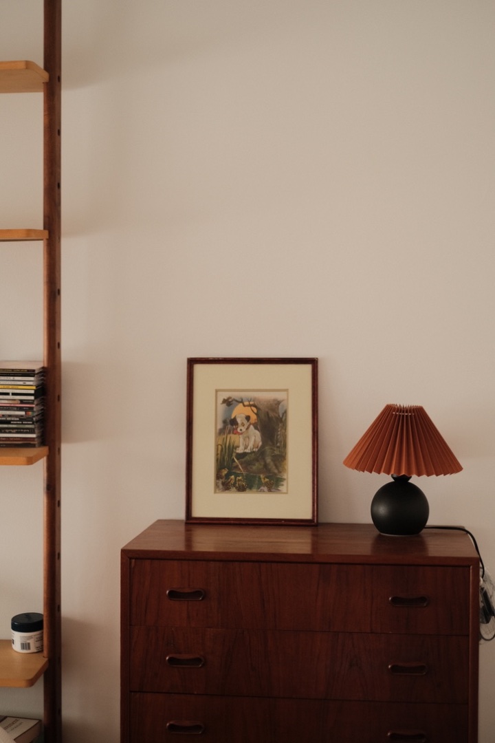Lamp on top of tallboy